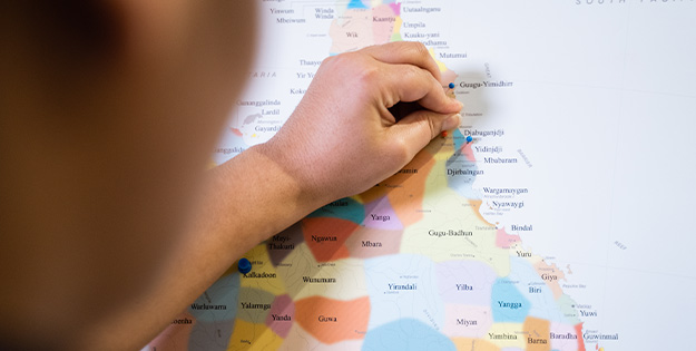 Putting pins on a map of Indigenous language groups in Australia
