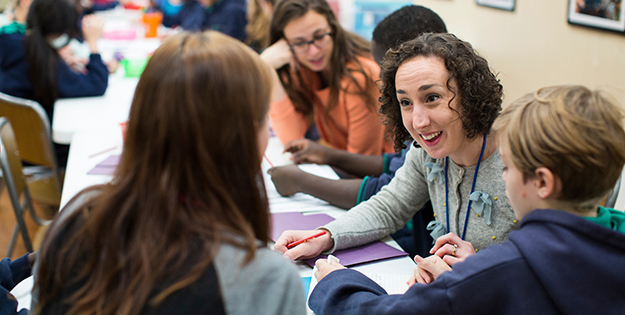 Teacher with students