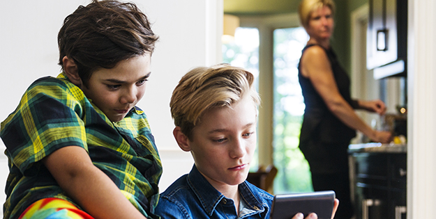 boys looking at screen
