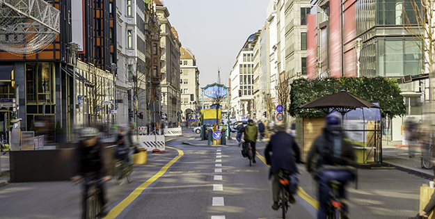 Modern European city with cyclists