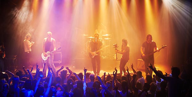 Band playing in front of large crowd