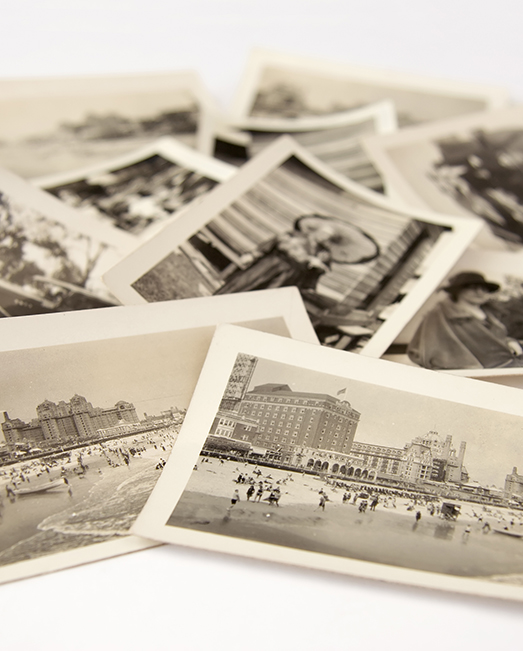 Pile of black and white photographs