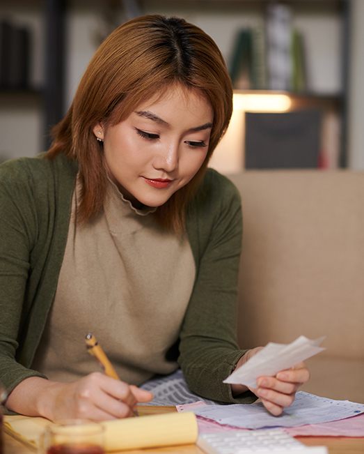 Student recording her receipts
