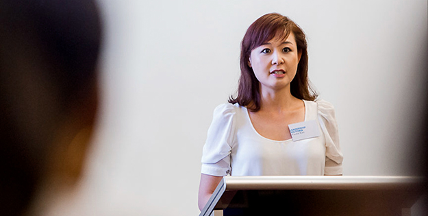 Youna Kim addresses an audience