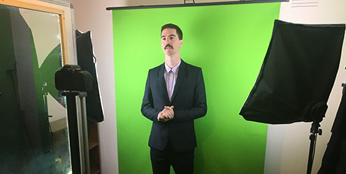 Steven Kolber teaching in front of green screen