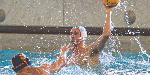 Danny Kerr throwing water polo ball