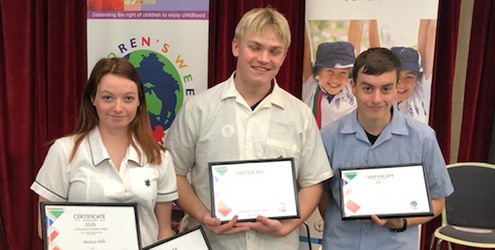 Madison Mills displays awards