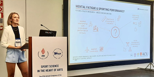 Dr Suzanna Russell presenting at a conference in Spain.