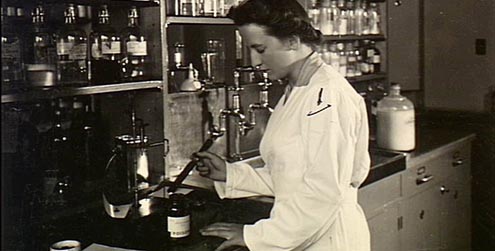 Sergeant J. Baird, AAMWS working at the 115th Australian General Hospital.