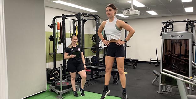 Gabriella Munteanu and Madison Pearson work out