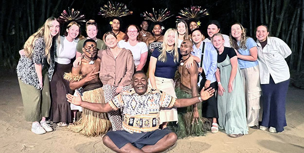 ACU student nurses enjoying Fijian culture.